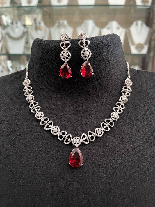 CZ necklace with ruby coloured stone