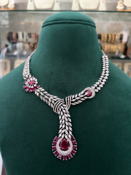 AD necklace with ruby coloured stones