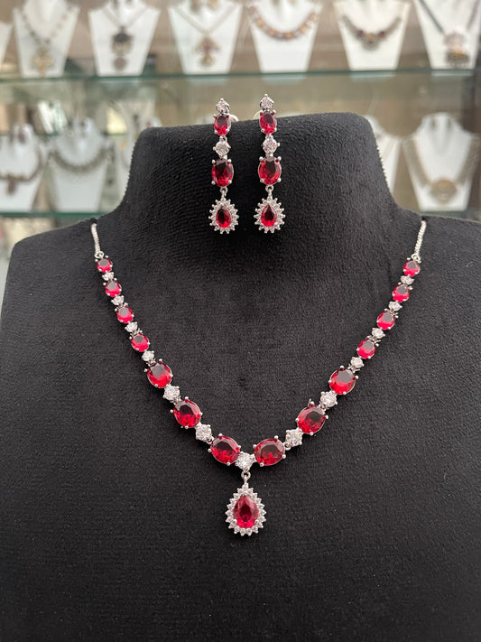 CZ necklace with ruby coloured stone