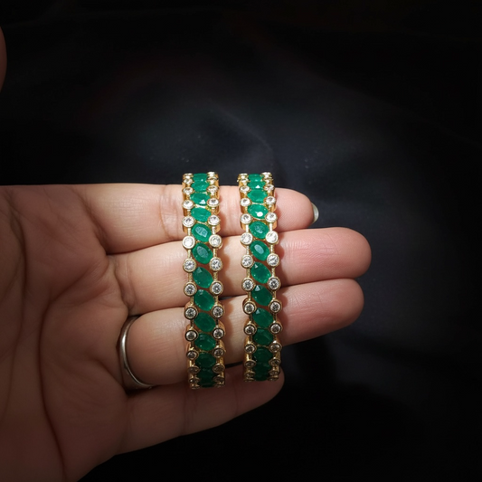 AD bangles with green stones