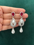 AD pearl earrings