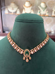 Antique Polki necklace with emerald coloured stone