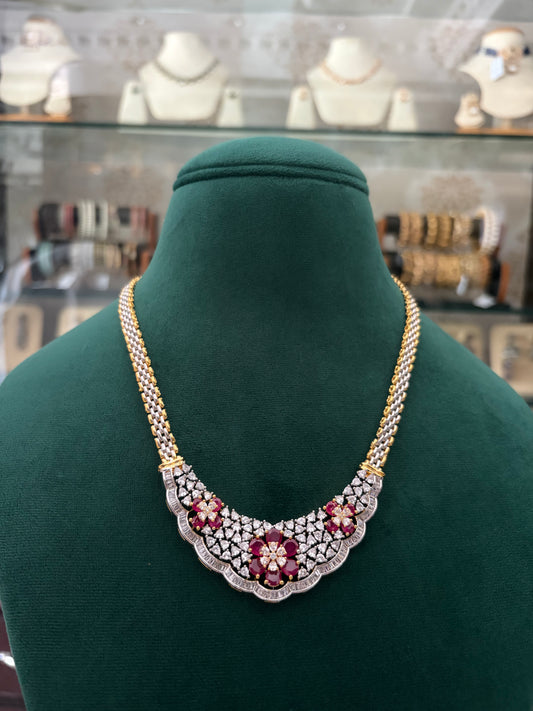 Long AD necklace with ruby coloured stones