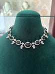 Tarabai AD necklace with emerald coloured stones
