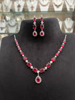 CZ necklace with ruby coloured stone
