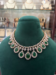 AD necklace with emerald coloured stone