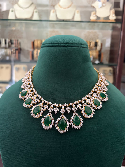 AD necklace with emerald coloured stone