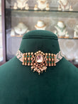 Gold plated moissanite choker with emerald coloured stone