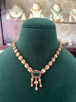 Polki necklace set with emerald coloured stone